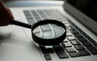 agence-olloweb-d9ILr-dbEdg-unsplash.jpg magnifying glass near gray laptop computer